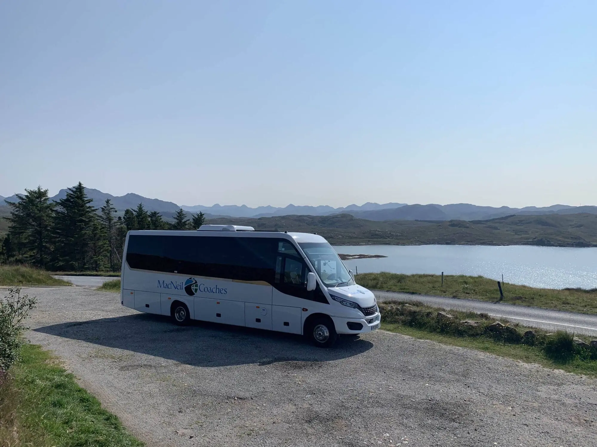 IMG macNeil Coaches Bus parked to view Scottish Landscape